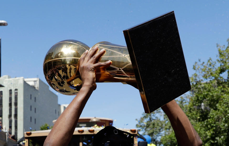 Get ready to draft so you can be holding a trophy at the end of the fantasy season. (AP Photo/Marcio Jose Sanchez)