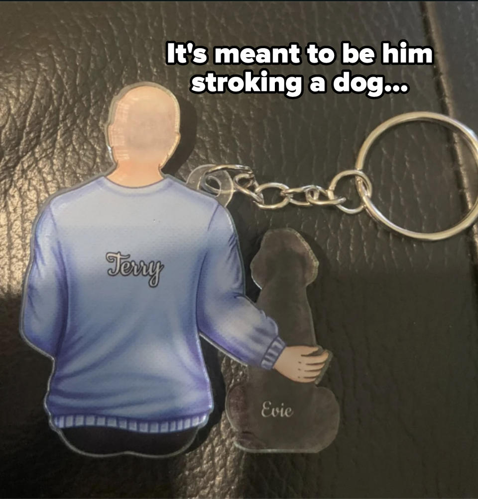 Cartoon figures of Terry and a dog named Evie are depicted on a keychain. Terry is shown from the back, hugging Evie