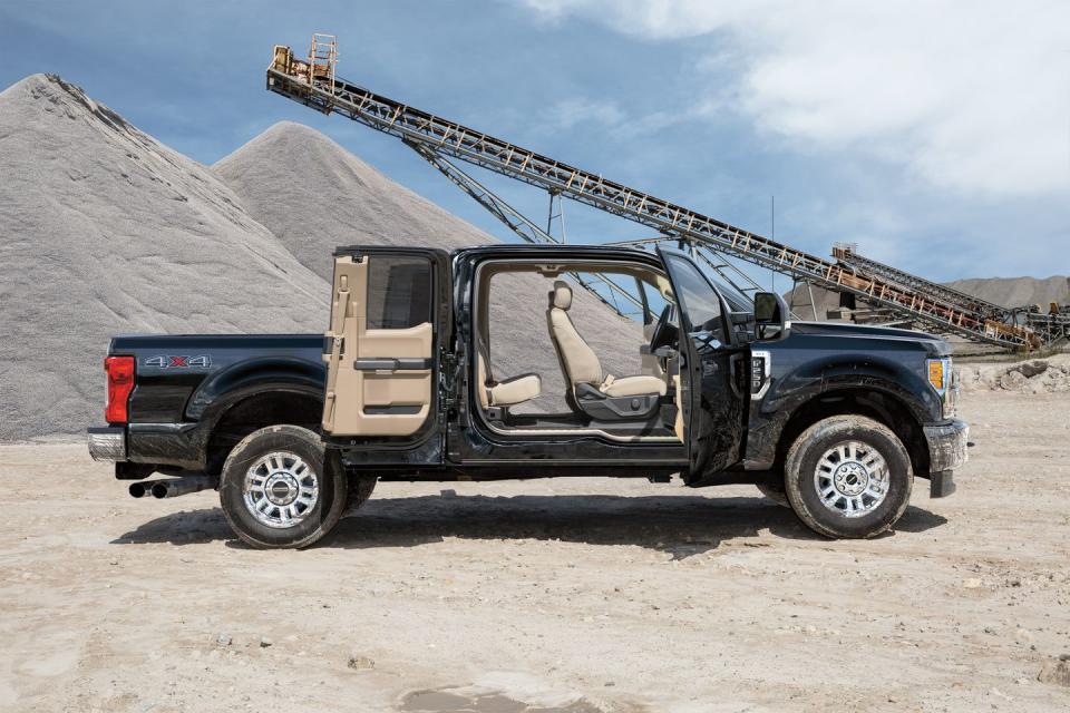 <p>Buyers can specify their Super Duty trucks with a two-door regular cab, four-door extended cab (seen here, with backwards-swinging rear doors), or a four-door crew cab with full-size doors front and rear. </p>