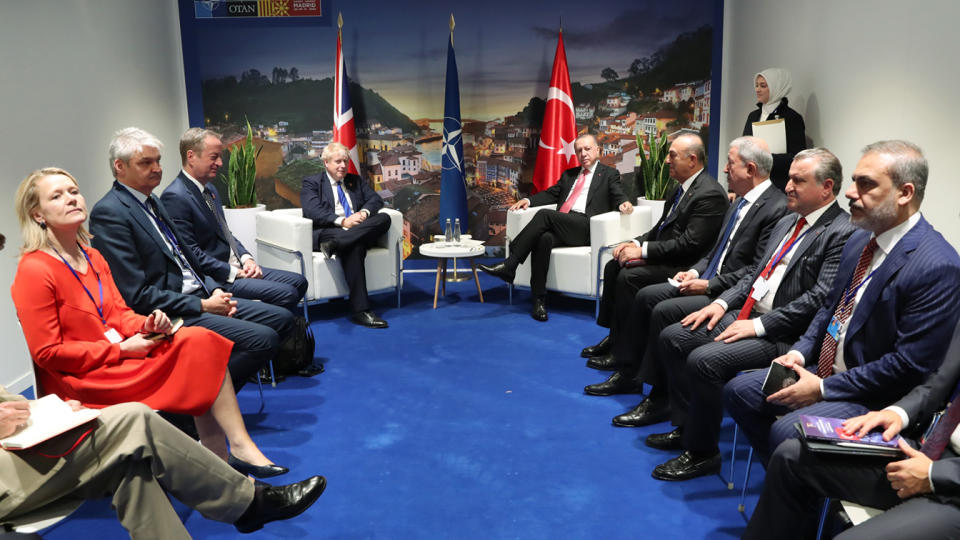 Turkish President Recep Tayyip Erdogan meets British Prime Minister Boris Johnson on the sidelines of the NATO Summit in Madrid, Spain on June 29, 2022. (Turkish Presidency/Murat Cetinmuhurdar/Handout/Anadolu Agency via Getty Images)