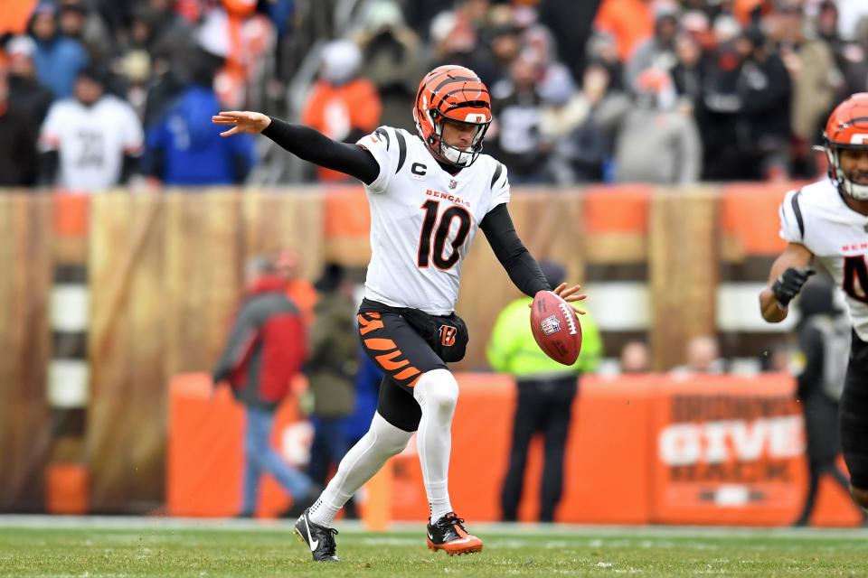 FILE - Cincinnati Bengals punter Kevin Huber (10) punts in the first half of an NFL football game against the Cleveland Browns, Sunday, Jan. 9, 2022, in Cleveland. Huber has been a Bengals fan all his life. He grew up in Cincinnati, went to college there and rooted for the city to celebrate a championship. The 36-year-old Bengals punter is the team's longest-tenured player and he's a victory away from helping deliver a Super Bowl title to his city - and fulfilling a dream that started as a young fan in the stands at Riverfront Stadium. (AP Photo/Nick Cammett, File)