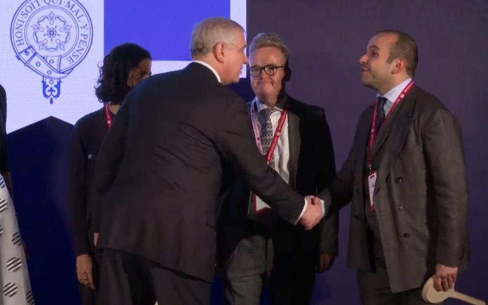 Prince Andrew, centre, shakes hands with Selman Turk at a Pitch@Palace event