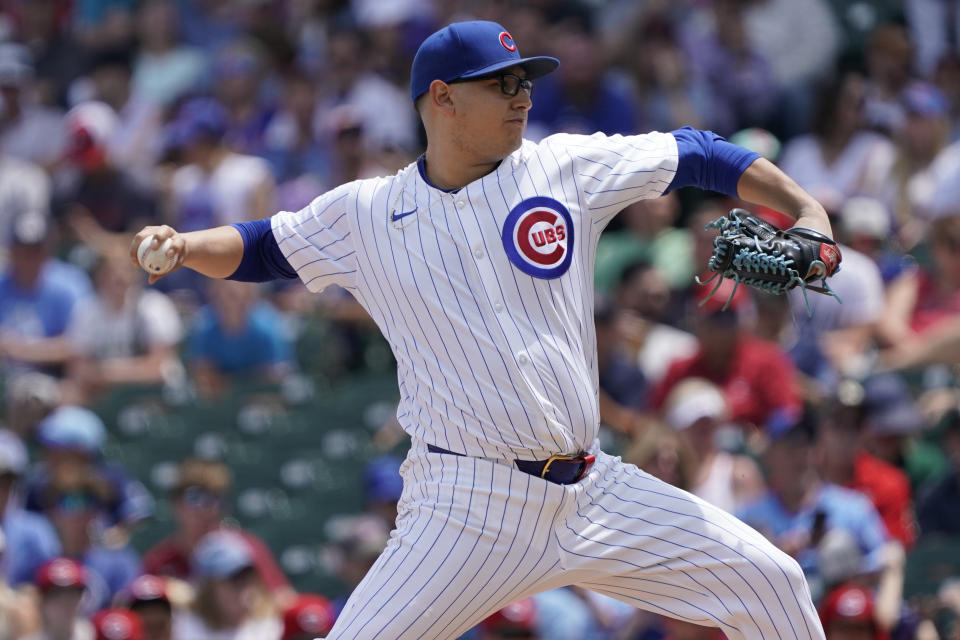 Chicago Cubs pitcher Javier Assad (72) throws the ball against the Cincinnati Reds during the first inning of a baseball game Friday, May 31, 2024, in Chicago. (AP Photo/David Banks)