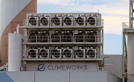 A facility for capturing CO2 from air of Swiss Climeworks AG is placed on the roof of a waste incinerating plant in Hinwil, Switzerland July 18, 2017. REUTERS/Arnd Wiegmann