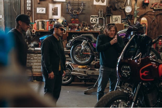 Carey Hart, Yaniv Evans, and Norman Reedus admire the new custom motorcycle.<p>Indian Motorcycles</p>