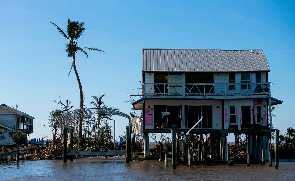 A damaged property is seen on a broken section of Pine Island Road on Thursday, Sept. 29, 2022, in Matlacha, Fla. Hurricane Ian made landfall on the coast of South West Florida as a category 4 storm Tuesday afternoon leaving areas affected with flooded streets, downed trees and scattered debris.