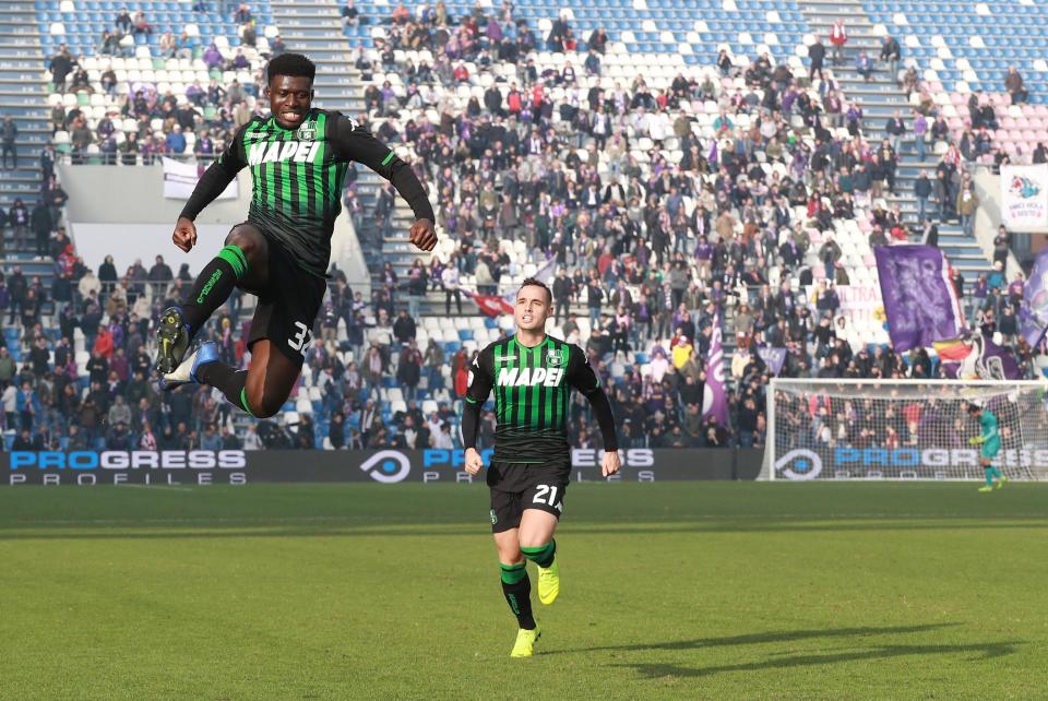 Sassuolo's Alfred Duncan jumps in celebration next to his teammate Pol Lirola after scoring during a Serie A soccer match between Sassuolo and Fiorentina at the Mapei stadium in Reggio Emilia, Italy, Sunday, Dec. 9, 2018. (Serena Campanini/ANSA via AP)