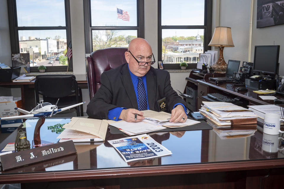 Union Parish special prosecutor Hugo Holland works in his office in Minden, La., on Friday, March 17, 2023. Holland drew criticism as a local prosecutor for displaying a portrait in his office of Confederate general and early KKK leader Nathan Bedford Forrest. (AP Photo/Scott Clause)