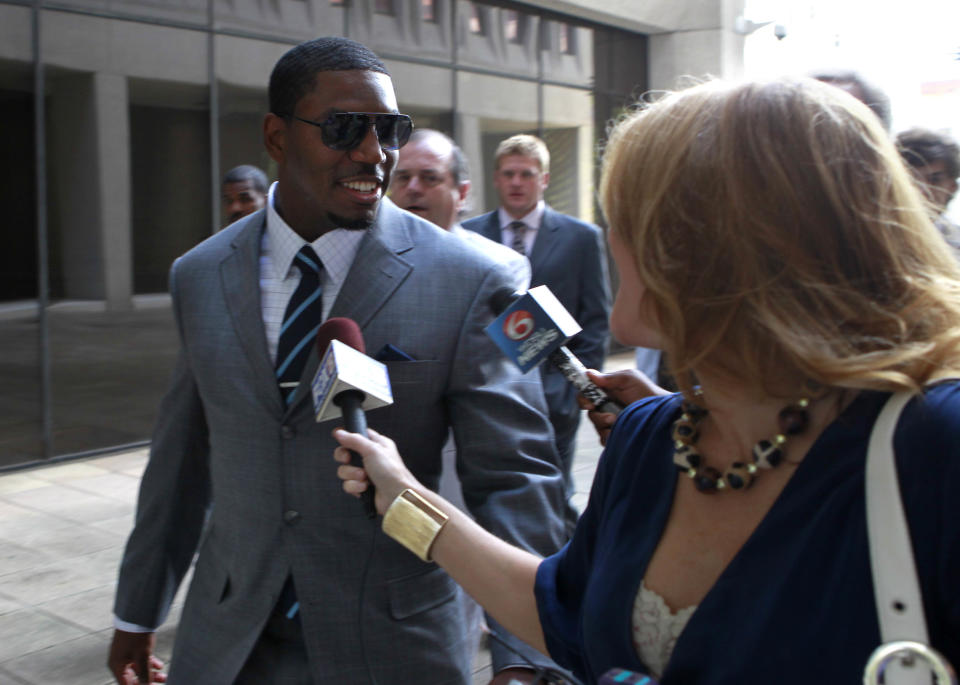 Suspended New Orleans Saints linebacker Jonathan Vilma arrives to testify at Federal Court in New Orleans, Thursday, July 26, 2012. Vilma is seeking a temporary restraining order that would allow him to return to work while his lawsuit against NFL Commissioner Roger Goodell is pending. Goodell suspended Vilma for the entire season for what the NFL has said was his leading role in a player-funded bounty program that paid cash bonuses to Saints defensive players for hits that injured opponents. (AP Photo/Gerald Herbert)