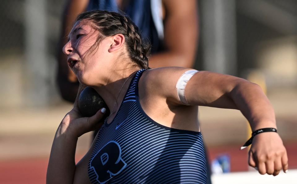 Redwood's Jennah Creason competes in the shot put during theThe 2022 West Yosemite League high school track and field championships at Golden West on Wednesday, May 4, 2022. She placed first with a personal record of 34 feet, 7.5 inches.