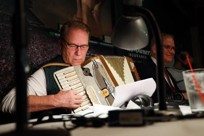 Michigan State men's basketball coach Tom Izzo plays the accordion at Reno's Sports Bar &amp; Grill during his radio show on Monday, Dec. 16, 2019.