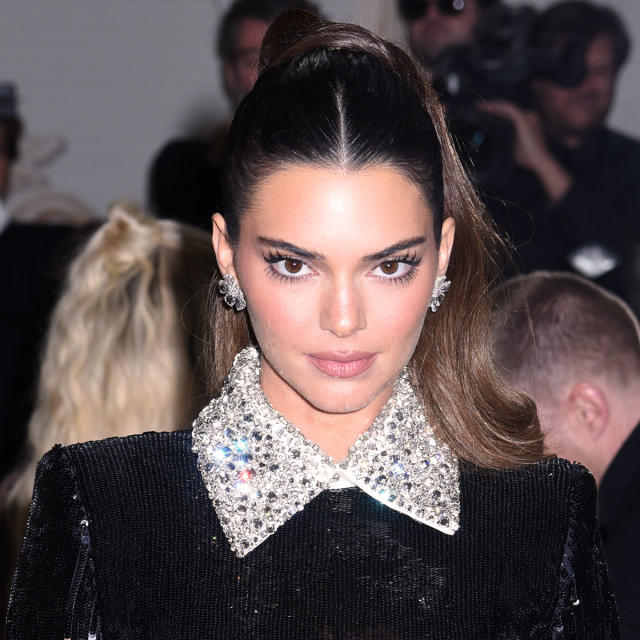 Kendall Jenner looks stunning in a black dress with matching