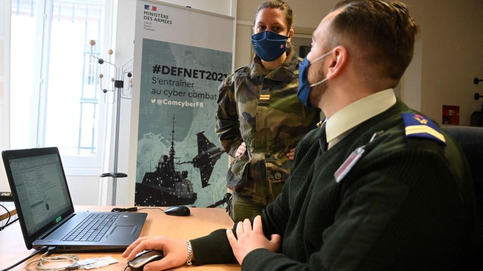 Soldiers from NATO member France attend a cyber defense exercise in 2021. Alliance members have pledged to boost their focus on new and disruptive technologies, including the areas of cyber and artificial intelligence. (Damien Meyer/AFP via Getty Images)