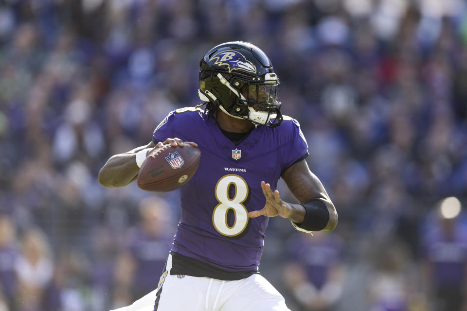 BALTIMORE, MARYLAND - NOVEMBER 05: Lamar Jackson #8 of the Baltimore Ravens throws a pass during an NFL football game between the Baltimore Ravens and the Seattle Seahawks at M&T Bank Stadium on November 05, 2023 in Baltimore, Maryland. (Photo by Michael Owens/Getty Images)