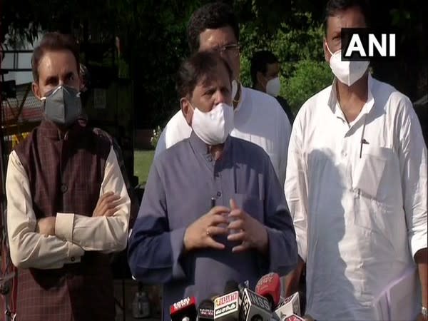 Congress MP Ahmed Patel speaking to reporters in New Delhi on Sunday.