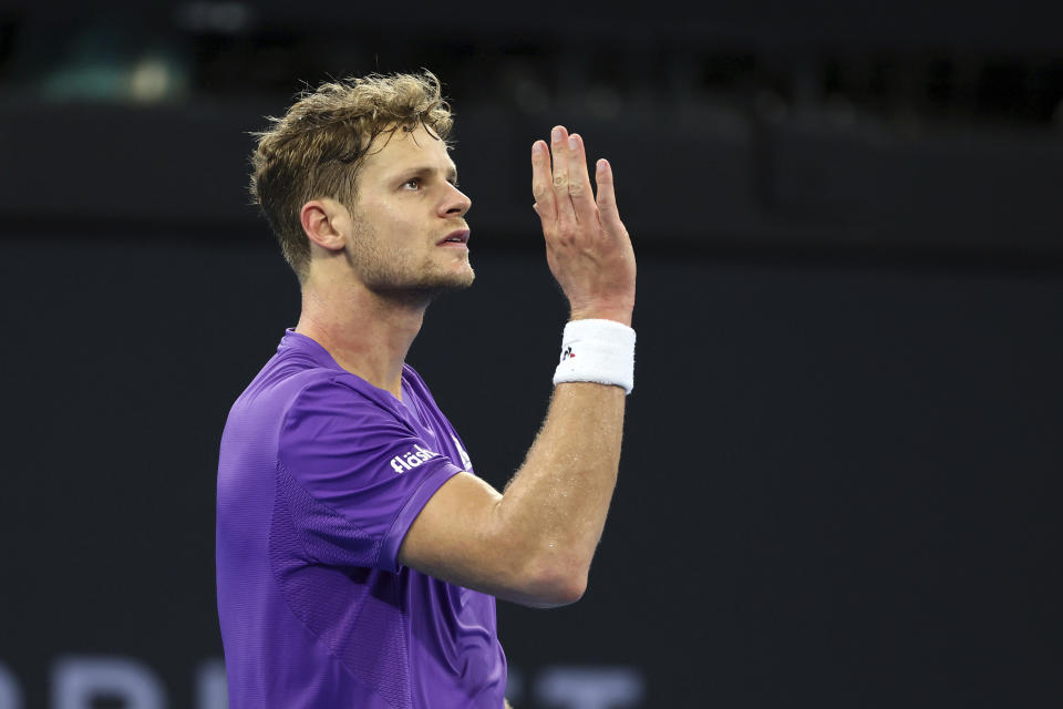 Yannick Hanfmann of Germany reacts after missing a shot in his match against Sebastian Korda of the USA during the Brisbane International tennis tournament in Brisbane, Australia, Tuesday, Jan. 2, 2024. (AP Photo/Tertius Pickard)