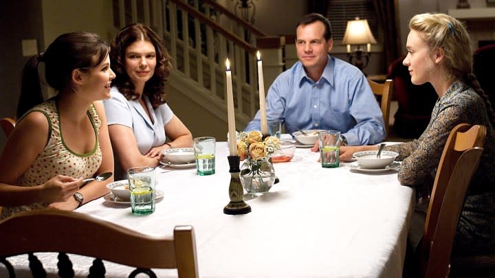 A family sits at a dinner table in Big Love.