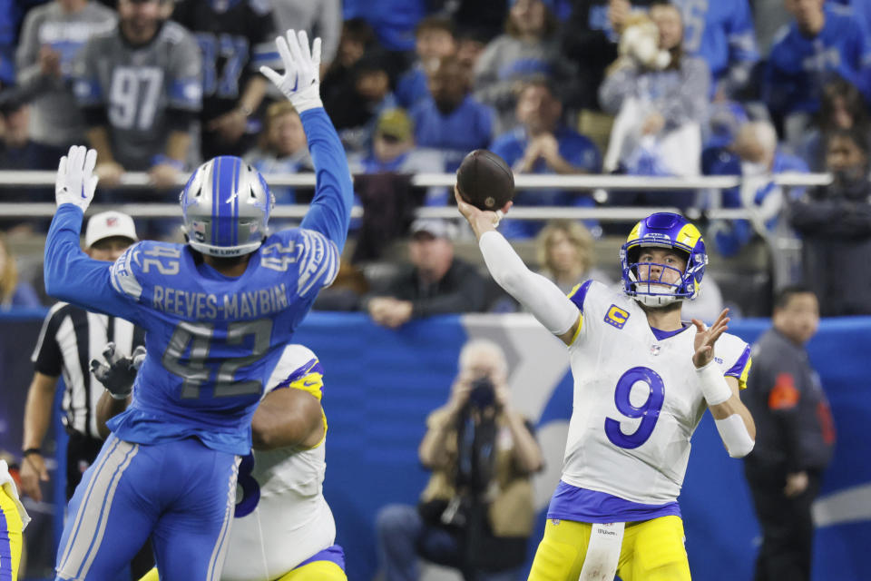 Detroit Lions linebacker Jalen Reeves-Maybin (42) pressures Los Angeles Rams quarterback Matthew Stafford (9) during the second half of an NFL wild-card playoff football game, Sunday, Jan. 14, 2024, in Detroit. (AP Photo/Duane Burleson)