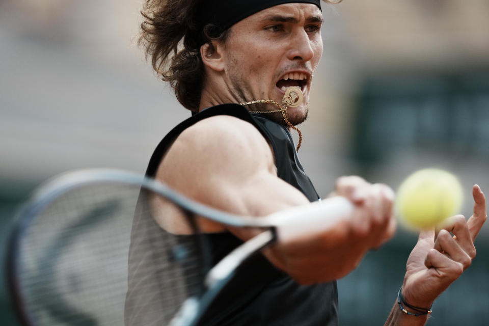 Germany's Alexander Zverev returns the ball to Spain's Alejandro Davidovich Fokina during their quarterfinal match of the French Open tennis tournament at the Roland Garros stadium Tuesday, June 8, 2021 in Paris. (AP Photo/Thibault Camus)