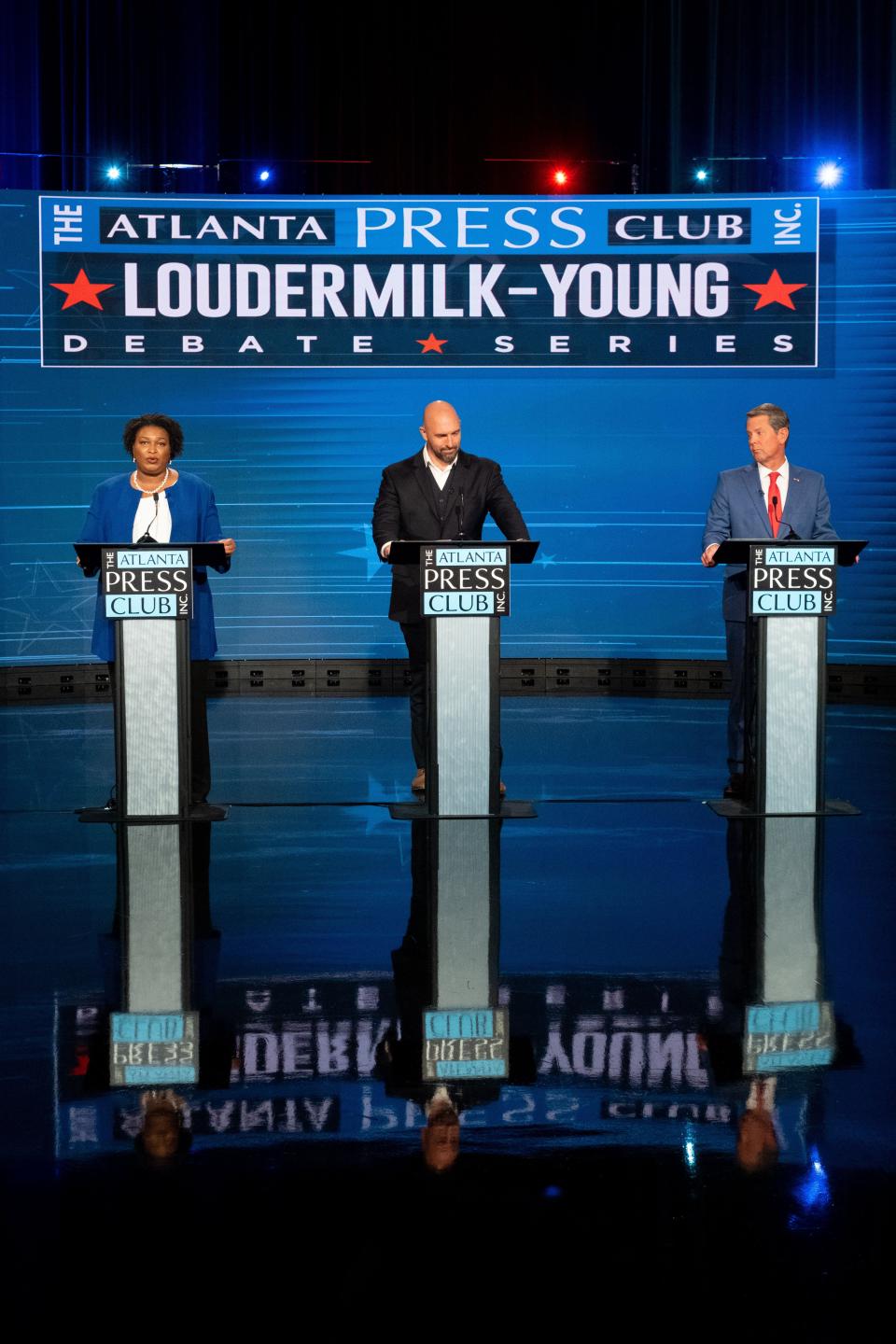 From the left: Stacey Abrams, Shane Hazel and Brian Kemp at the Loudermilk-Young debate.