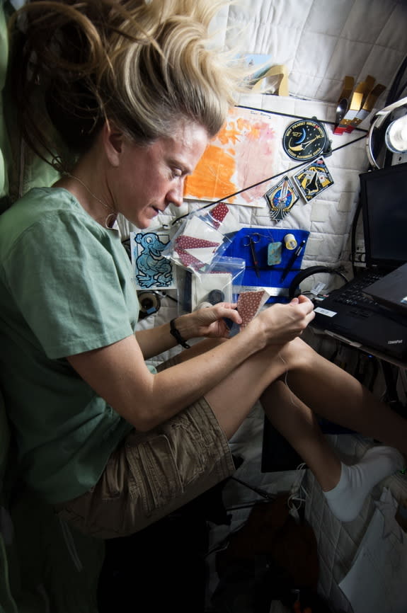 The International Space Station may help researchers evaluate self-guided tools meant to aid astronauts in enduring taxing, anxiety-filled, long-duration space voyages. Here, NASA's Karen Nyberg, an Expedition 36 flight engineer, uses some of h