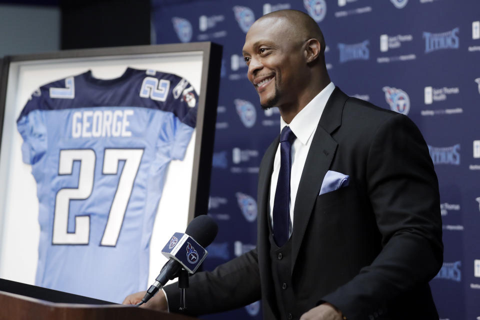 Former Tennessee Titans running back Eddie George speaks during an announcement at the Titans' NFL football training facility Wednesday, June 12, 2019, in Nashville, Tenn., that his number will be retired. The team will retire George's No. 27 and former quarterback Steve McNair's No. 9 on Sept. 15 at their home opener against the Indianapolis Colts. (AP Photo/Mark Humphrey)