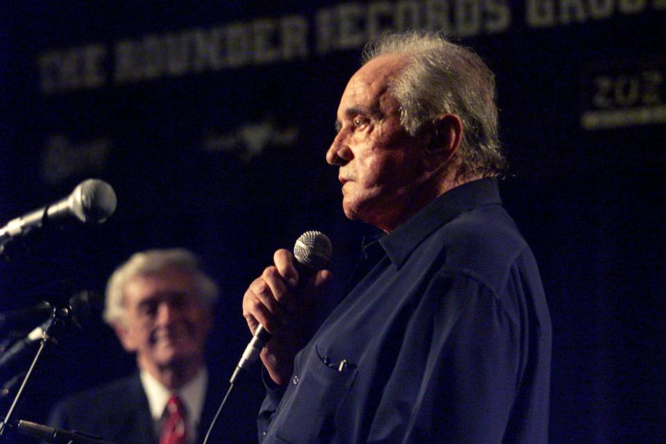 Country music legend Johnny Cash recites a poem about the flag after receiving the Spirit of Americana Free Speech Award from the American Music Association and the First Amendment Center during the Americana Honors & Awards show at the downtown Hilton on Sept. 13, 2002.