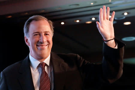 Institutional Revolutionary Party (PRI) presidential candidate Jose Antonio Meade waves to the audience during a conference organised by the Mexican Construction Industry Association in Guadalajara, Mexico March 23, 2018. REUTERS/Henry Romero