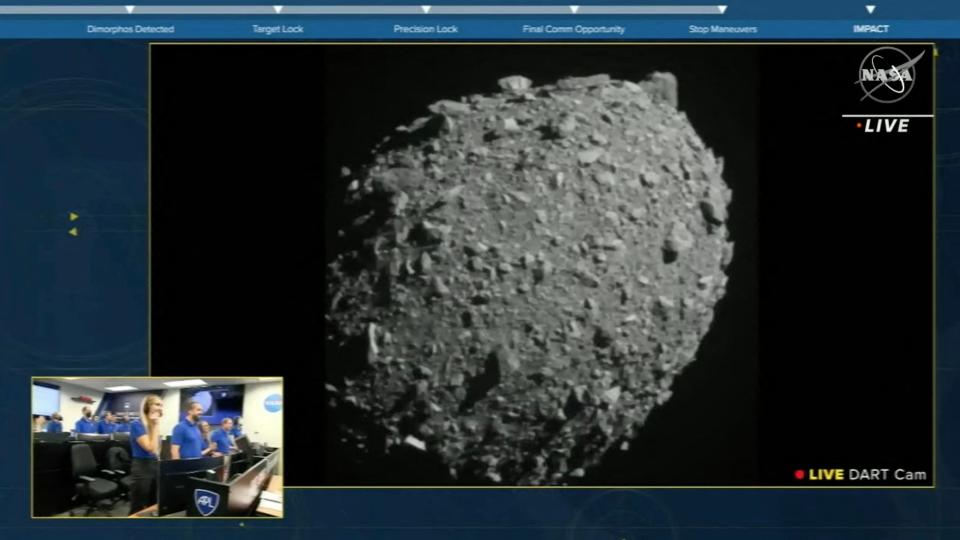 This screengrab made from NASA live feed on Monday shows Dimorphos just before the Double Asteroid Redirection Test, or DART, made impact with the asteroid, as watched by the NASA team (bottom left) at DART headquarters in Laurel, Md.