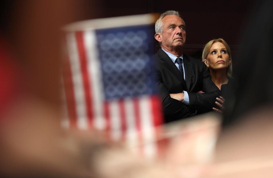 Actress Cheryl Hines and her husband, independent presidential candidate Robert F. Kennedy Jr., campaign on March 26, 2024, in Oakland, Calif.