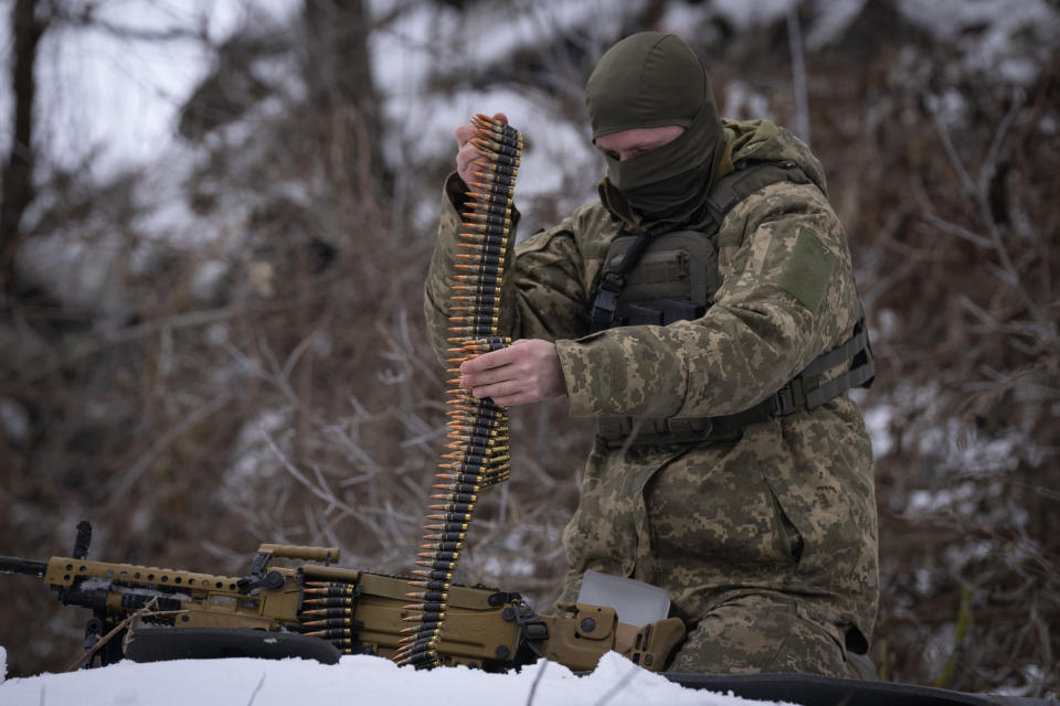 A member of the pro-Ukrainian Russian ethnic Siberian Battalion practices at a military training close to Kyiv, Ukraine, Wednesday, Dec. 13, 2023. Ukraine's military has formed a battalion of soldiers made up entirely of Russian citizens who want to fight against Russian invasion.(AP Photo/Efrem Lukatsky)