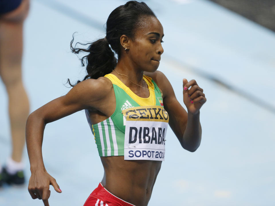 Ethiopia's Genzebe Dibaba runs to win the women's 3000m final during the Athletics World Indoor Championships in Sopot, Poland, Sunday, March 9, 2014. (AP Photo/Petr David Josek)