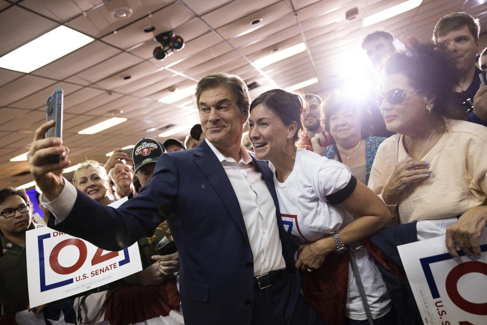 Mehmet Oz, a Republican candidate for U.S. Senate in Pennsylvania, greets supporters in Bensalem, Pa., Tuesday, Nov. 1, 2022. (AP Photo/Ryan Collerd)