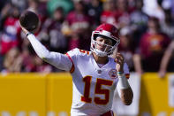 Kansas City Chiefs quarterback Patrick Mahomes (15) passing the ball during the first half of an NFL football game against the Washington Football Team, Sunday, Oct. 17, 2021, in Landover, Md. (AP Photo/Alex Brandon)