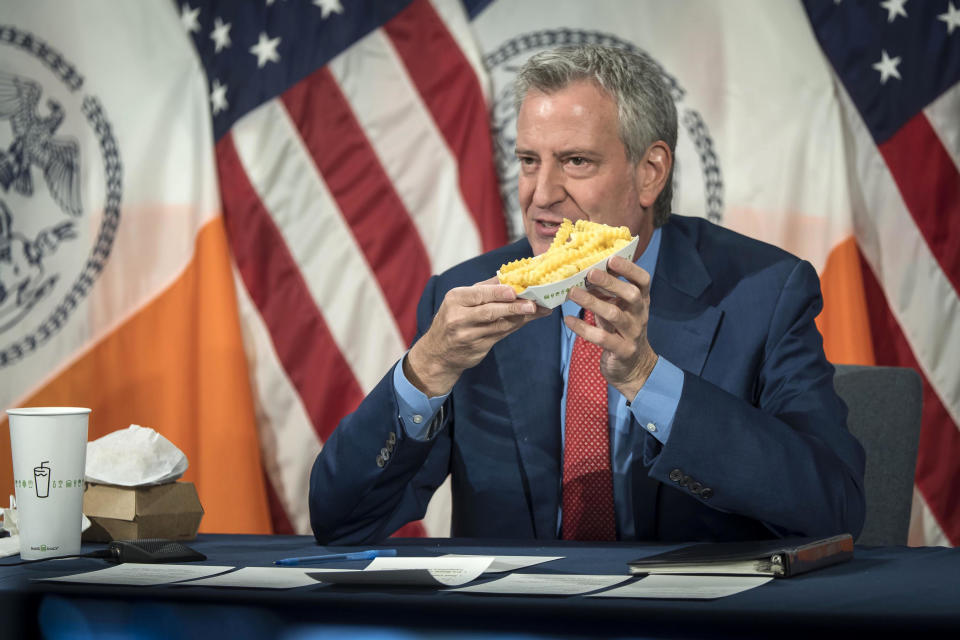 New York Mayor Bill de Blasio holds up a side of Shake Shack fries at City Hall on May 13, 2021. / Credit: Ed Reed/Mayoral Photography Office