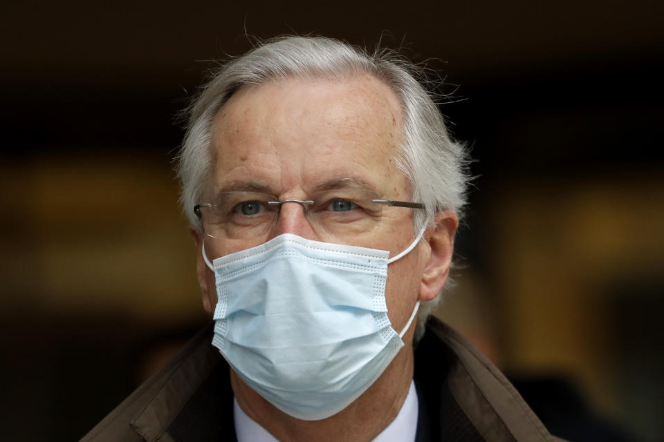 EU Chief Negotiator Michel Barnier walks to a conference centre in Westminster in London, Sunday, Nov. 29, 2020. Teams from Britain and the European Union are continuing face-to-face talks on a post-Brexit trade deal in the little remaining time. (AP Photo/Kirsty Wigglesworth)