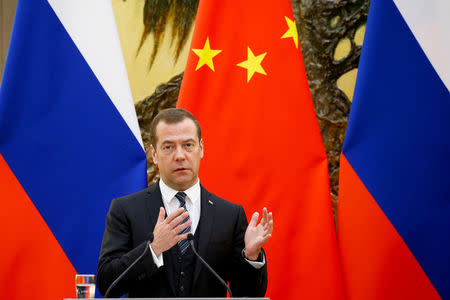 Russian Prime Minister Dmitry Medvedev speaks during a news conference after talks with Chinese Premier Li Keqiang at the Great Hall of the People in Beijing, China, November 1, 2017. REUTERS/Thomas Peter