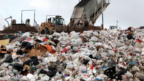 PHOTO: In this Dec. 26, 2012, file photo, a San Francisco Recology truck drops about 20 tons of trash at the Waste Management landfill in Livermore, Calif. (San Francisco Chronicle via Getty Images, FILE)