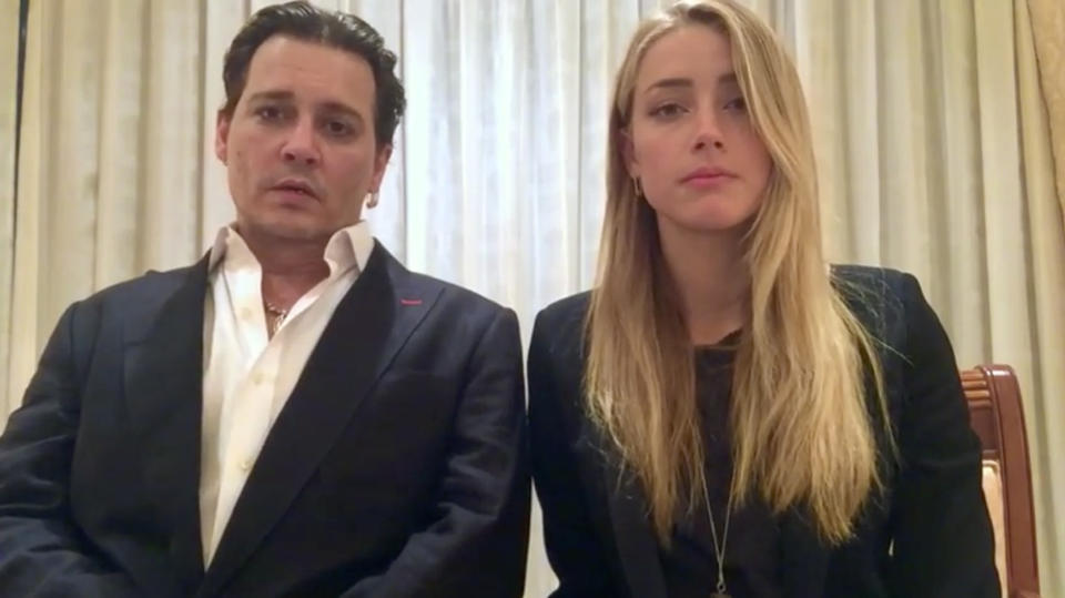 In this image made from video released by the Australian Government Department of Agriculture and Water Resources on Monday, April 18, 2016, actor Johnny Depp and his wife, Amber Heard speak in a videotaped apology played during Monday's hearing at the Southport Magistrates Court on Queensland state's Gold Coast. Depp and Heard pleaded guilty Monday to providing a false immigration document amid allegations she smuggled the couple's dogs to Australia, but managed to avoid jail time over what was dubbed the "war on terrier" debacle. (Australian Government via AP Video) AUSTRALIA OUT