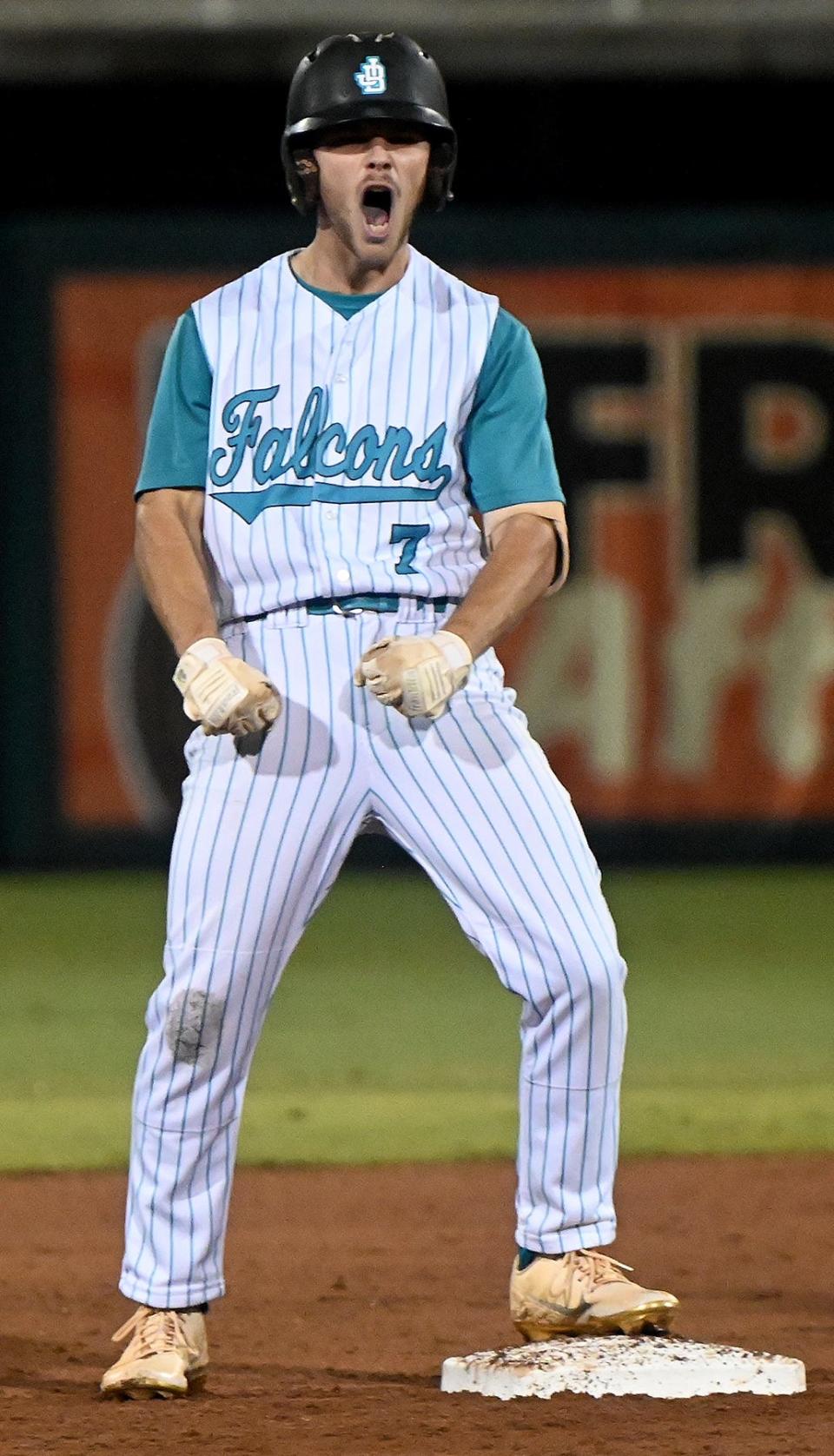 Jensen Beach High School Kyle Derrenbacker (7) celebrates a double on second base during their game Dunedin during a 4A state semifinal in Fort Myers, Monday, May 23, 2022. Jensen Beach defeated Dunedin 2-0 in a game that finished early Tuesday morning.