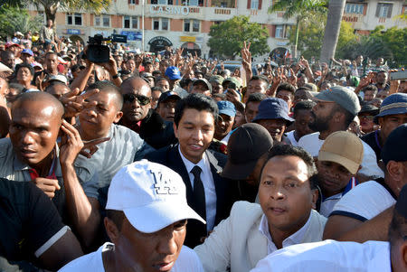 Madagascar’s former President Andry Rajoelina attends a march in protest after the president denounced unrest in which two people were killed as a "coup" intended to divide the country's people in Antananarivo, Madagascar April 23, 2018. REUTERS/Clarel Faniry Rasoanaivo