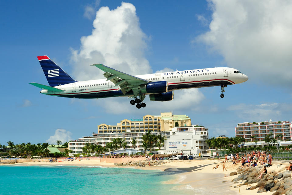 Incoming passengers land over ridiculously blue water and an expansive beach on their way to this Caribbean hub. But beach goers beware: Last year, a <a href="http://www.huffingtonpost.com/2012/04/09/woman-blown-over-by-jet-p_n_1411870.html" target="_blank">woman was blown over by the jet propulsion from a JetBlue flight taking off</a> at the nearby runway (located just outside the photo to the right). 