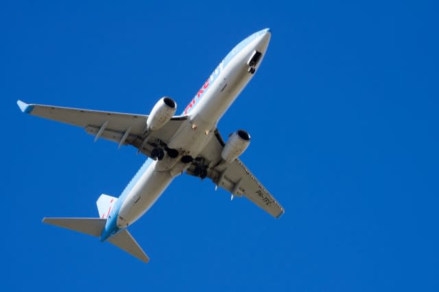 TENERIFE SUR AIRPORT, TENERIFE, CANARY ISLANDS - JANUARY 17, 2014: A Thomson Holidays Boeing 757 taking off from Tenerife south