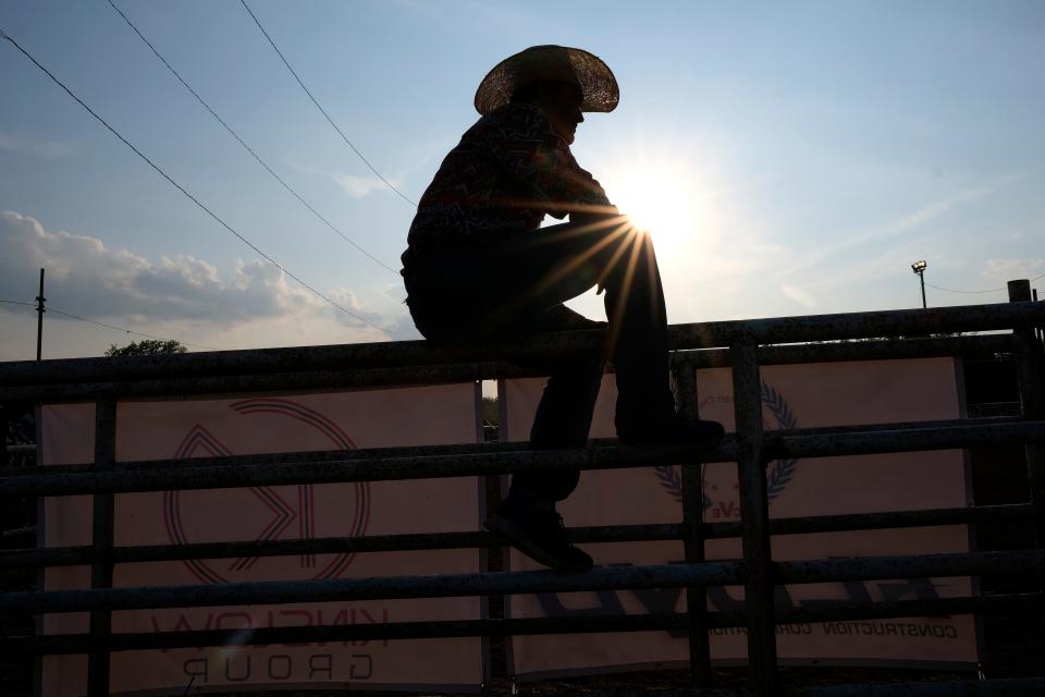 Bull rider Zorgn Jemic prepares before his event at the Boley, Oklahoma parade and rodeo on Memorial Day weekend in 2023.