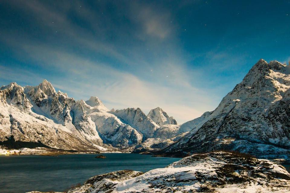 <p>Snow covered mountains surround a quiet lake in Norway // January 9, 2017</p>