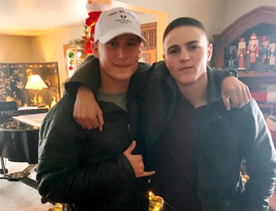 Rylee McCollum, right, poses with Eli Stone in December 2019 at Stone's House in Jackson, Wyo. McCollum was killed in Kabul on Aug. 26, 2021.