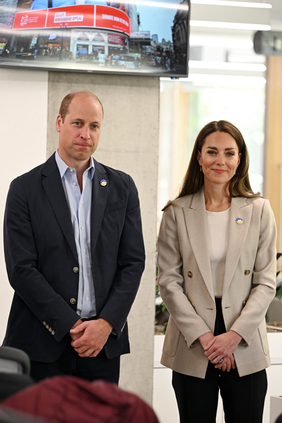 kate middleton wearing beige reiss blazer, white shirt, and black pants, The Duke and Duchess of Cambridge visiting the Disasters Emergency Committee (DEC) to learn about the ongoing support for people affected by the conflict in Ukraine (Photo by Jeff Spicer/Getty Images)