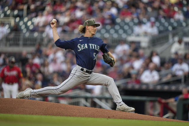 Seattle Mariners starting pitcher Bryce Miller delivers in the first inning of a baseball game against the Atlanta Braves, Friday, May 19, 2023, in Atlanta. (AP Photo/Brynn Anderson)