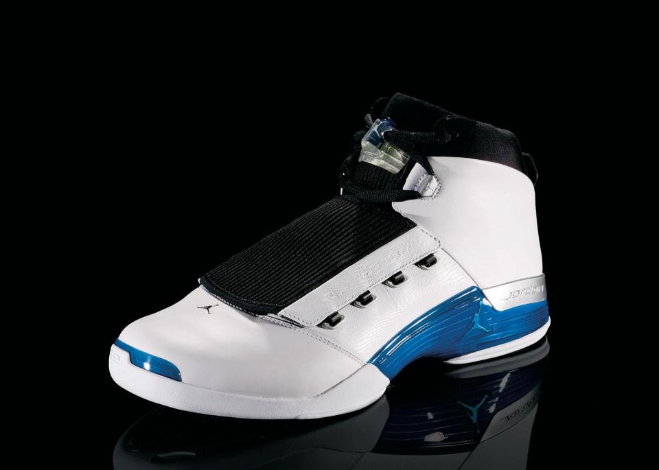 <p>Air Jordan XVII - "Jazzed Up" (2002): Packaged in a metal briefcase which included a CD-ROM, this is the shoe MJ wore in his return to the court with the Washington Wizards. The sole's designed is based on a golf course, an homage to Jordan's retirement. (Photo courtesy of Nike)</p>