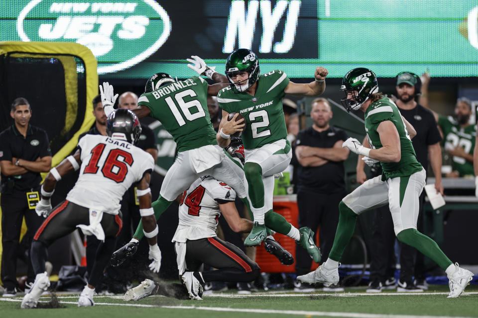 New York Jets quarterback Zach Wilson (2) rushes during the first half of a preseason NFL football game against the Tampa Bay Buccaneers, Saturday, Aug. 19, 2023, in East Rutherford, N.J. (AP Photo/Adam Hunger)